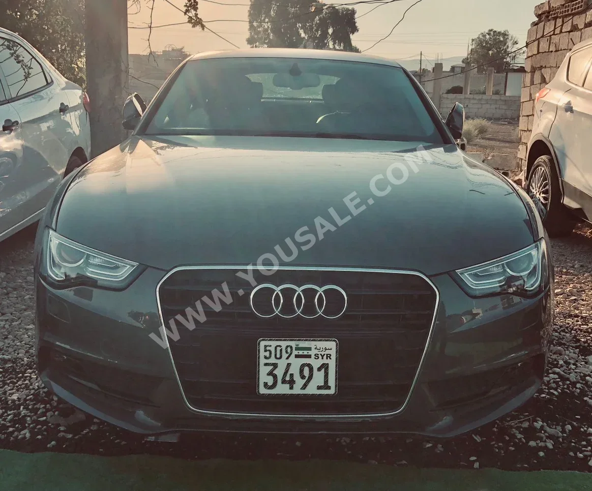 Audi  A5  2015  Automatic  173,000 km  4 Cylinder  FWD  Sedan  Brown  Gasoline