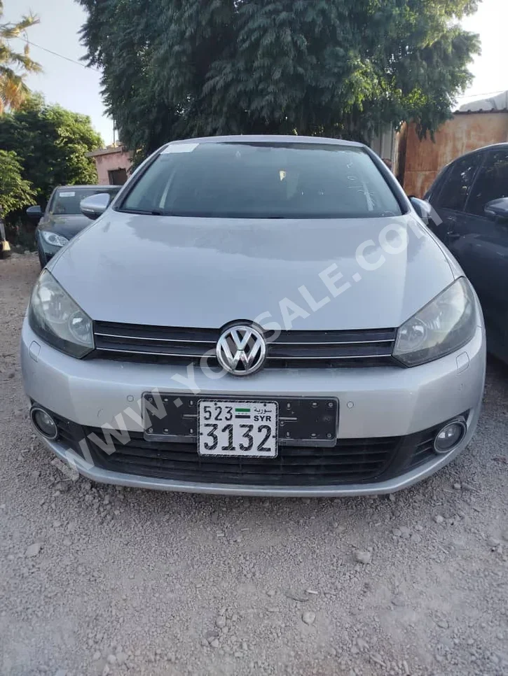 فوكس واغن غولف TDI 2011 اتوماتيك 201,000 كم 4 سلندر دفع أمامي هاتشباك فضي ديزل