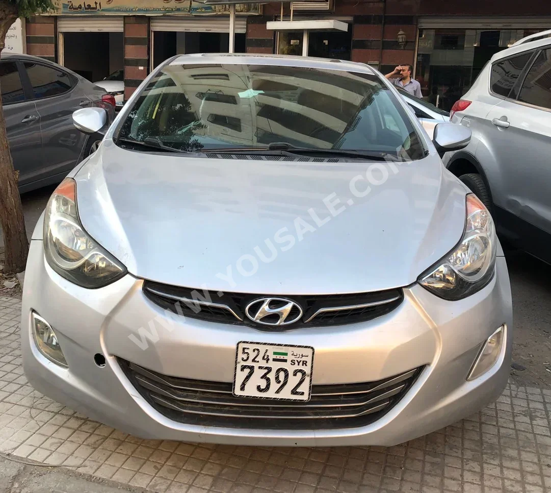 Hyundai  Elantra  2012  Automatic  320,000 km  4 Cylinder  FWD  Sedan  Silver  Gasoline