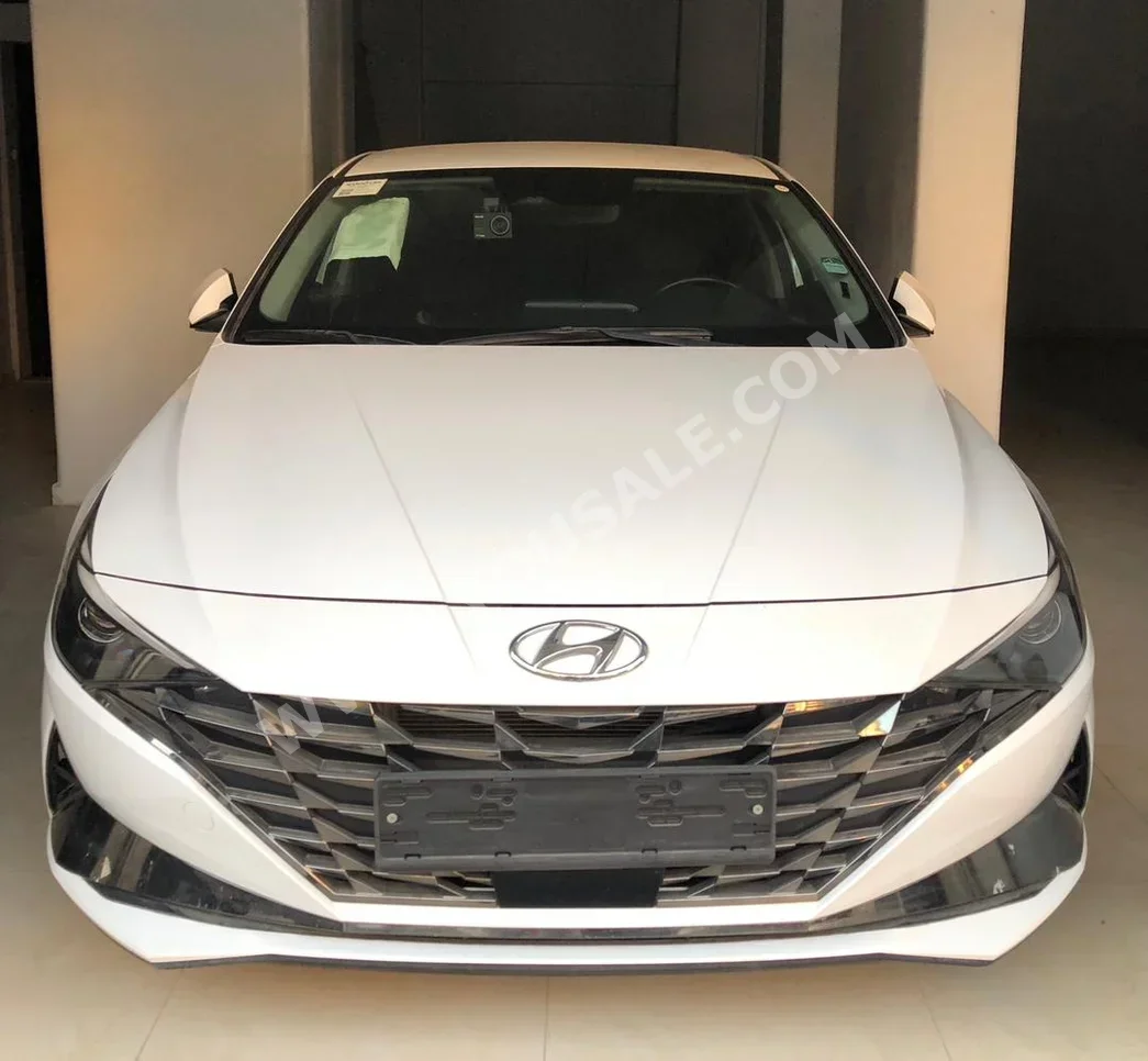 Hyundai  Avante  2021  Automatic  120,000 km  4 Cylinder  FWD  Sedan  White  Hybrid