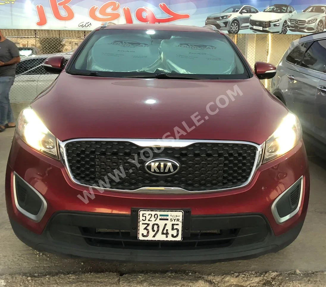 Kia  Sorento  2015  Automatic  123,000 km  4 Cylinder  4WD  SUV  Dark Red  Gasoline