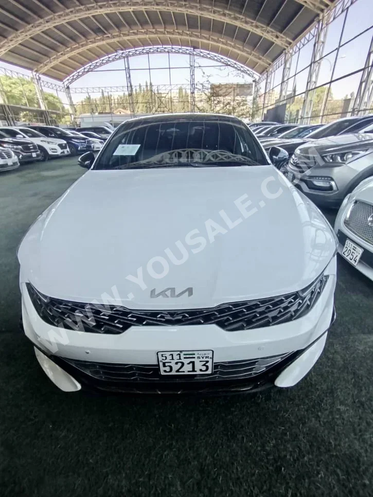Kia  K5  2021  Automatic  53,000 km  4 Cylinder  FWD  Sedan  White  Gasoline