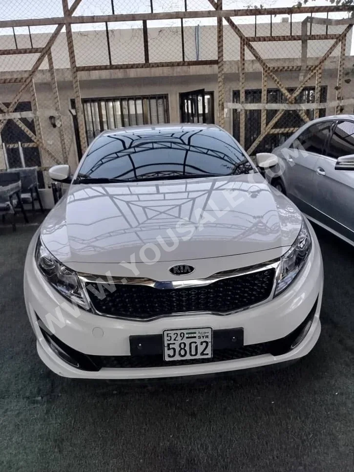 Kia  K5  2011  Automatic  117,000 km  4 Cylinder  FWD  Sedan  White  Gasoline