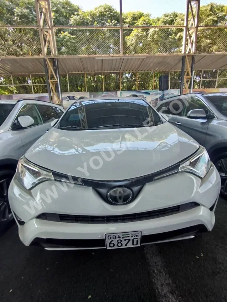 Toyota  Rav 4  2017  Automatic  90,000 km  4 Cylinder  FWD  SUV  White  Gasoline