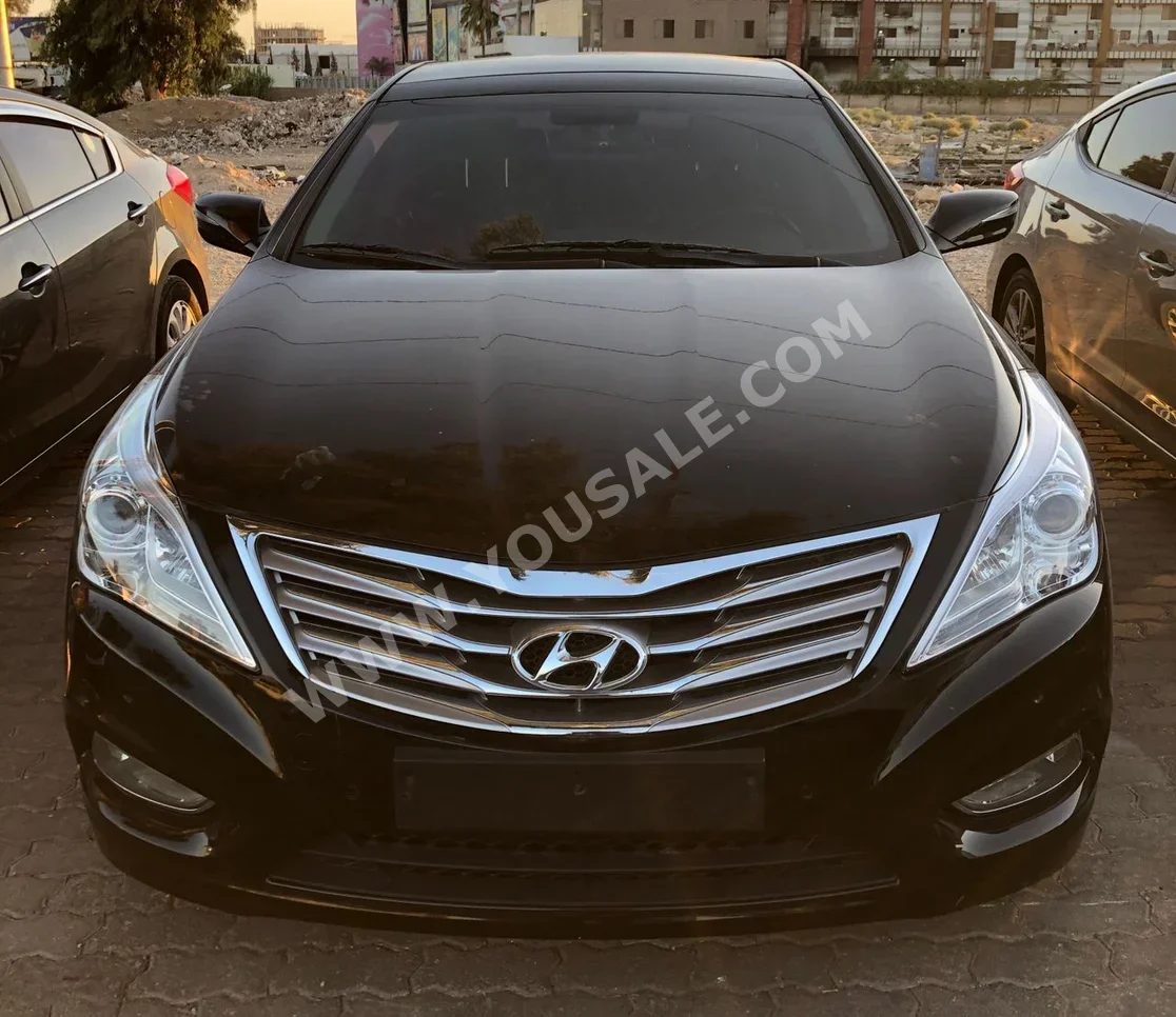 Hyundai  Azera  2011  Automatic  190,000 km  4 Cylinder  FWD  Sedan  Black  Gasoline