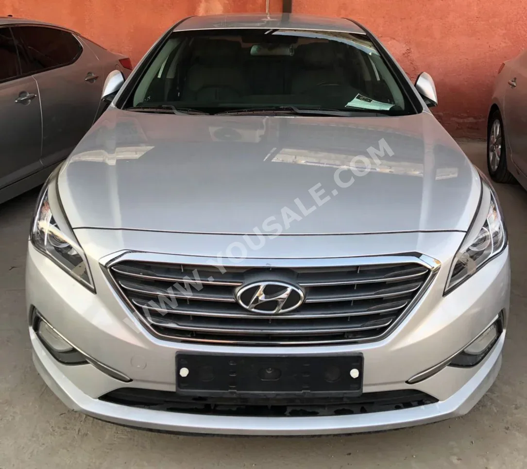 Hyundai  Sonata  2015  Automatic  117,000 km  4 Cylinder  FWD  Sedan  Silver  Gasoline
