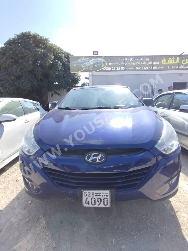 Hyundai  Tucson  2013  Automatic  162,000 km  4 Cylinder  FWD  SUV  Blue  Gasoline