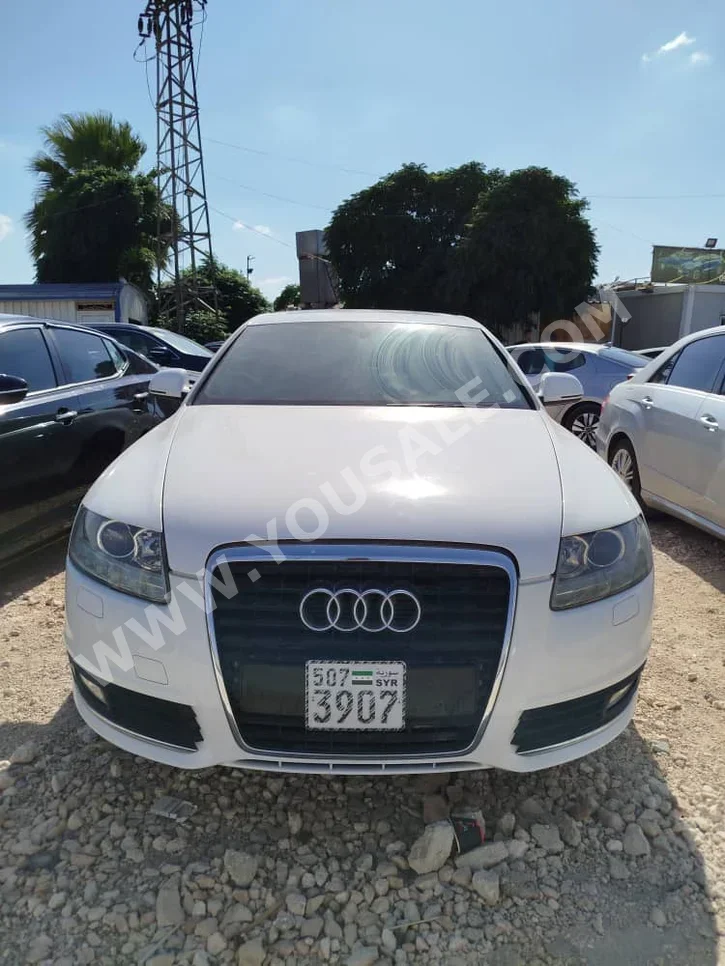 Audi  A6  2011  Automatic  185,796 km  6 Cylinder  RWD  Sedan  White  Gasoline