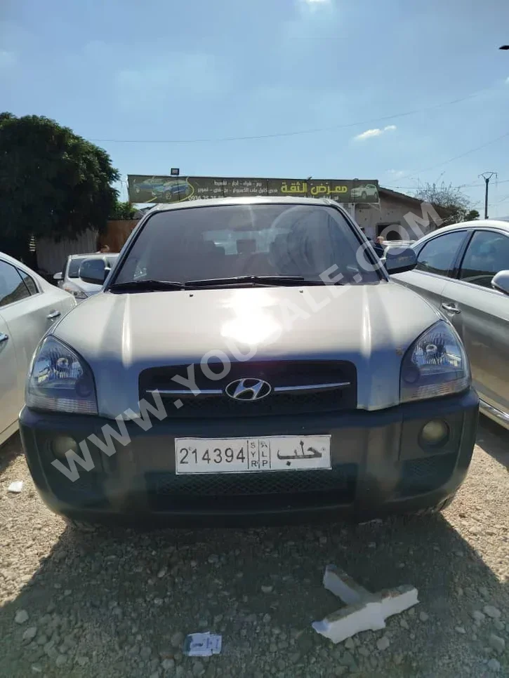 Hyundai Tucson 2005 Automatic 151,896 km 4 Cylinder FWD SUV Gray Metallic Diesel