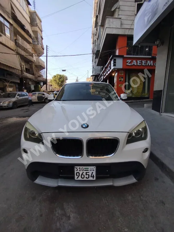 BMW X-Series 1 2011 Automatic 220,000 km 4 Cylinder FWD Hatchback White Diesel