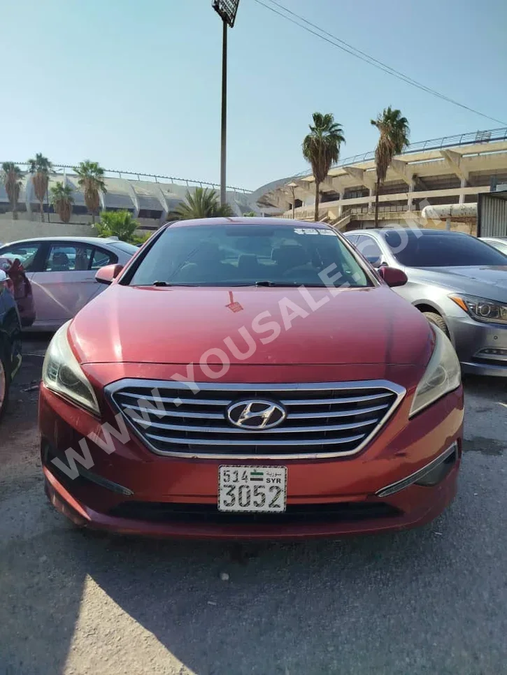 هيونداي سوناتا 2015 اتوماتيك 170,000 كم 4 سلندر دفع أمامي سيدان أحمر بنزين