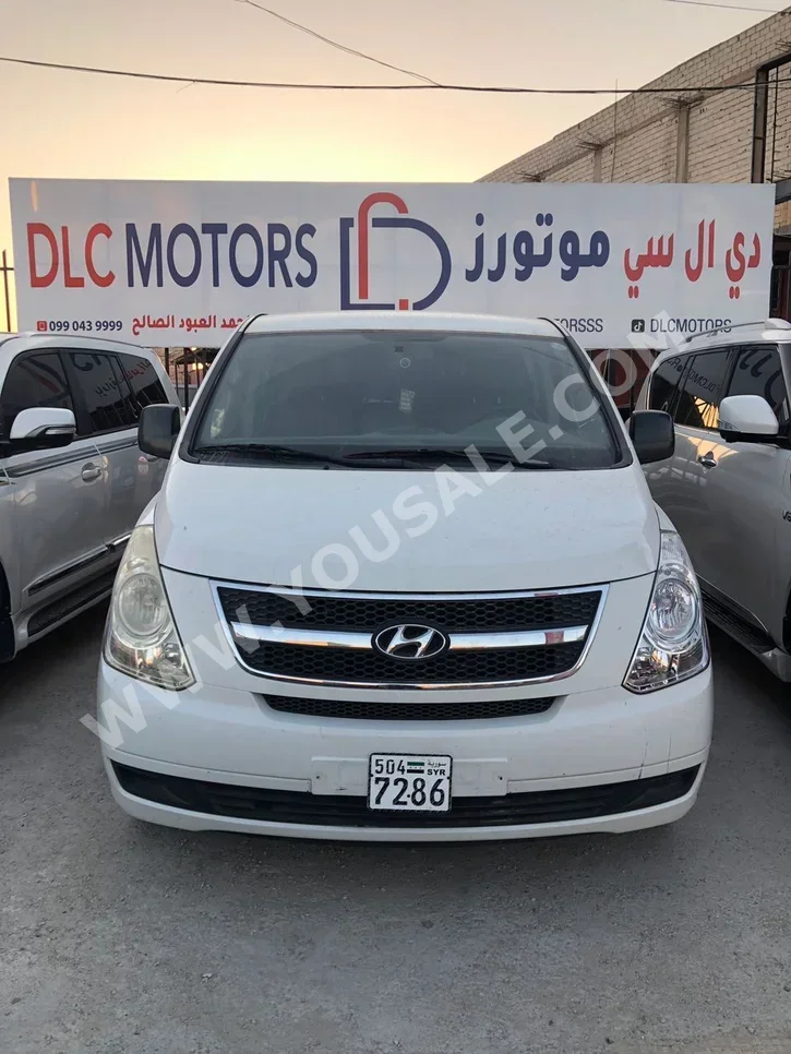Hyundai  H1  2011  Automatic  198,000 km  4 Cylinder  FWD  Van / Bus  White  Gasoline