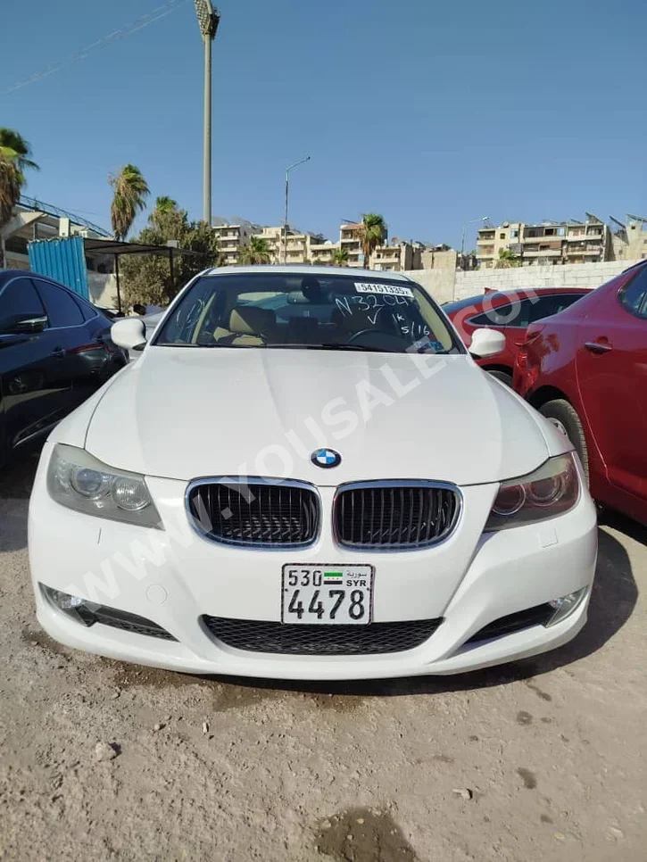 BMW  3-Series  328i  2015  Automatic  138,000 km  4 Cylinder  RWD  Sedan  White  Gasoline