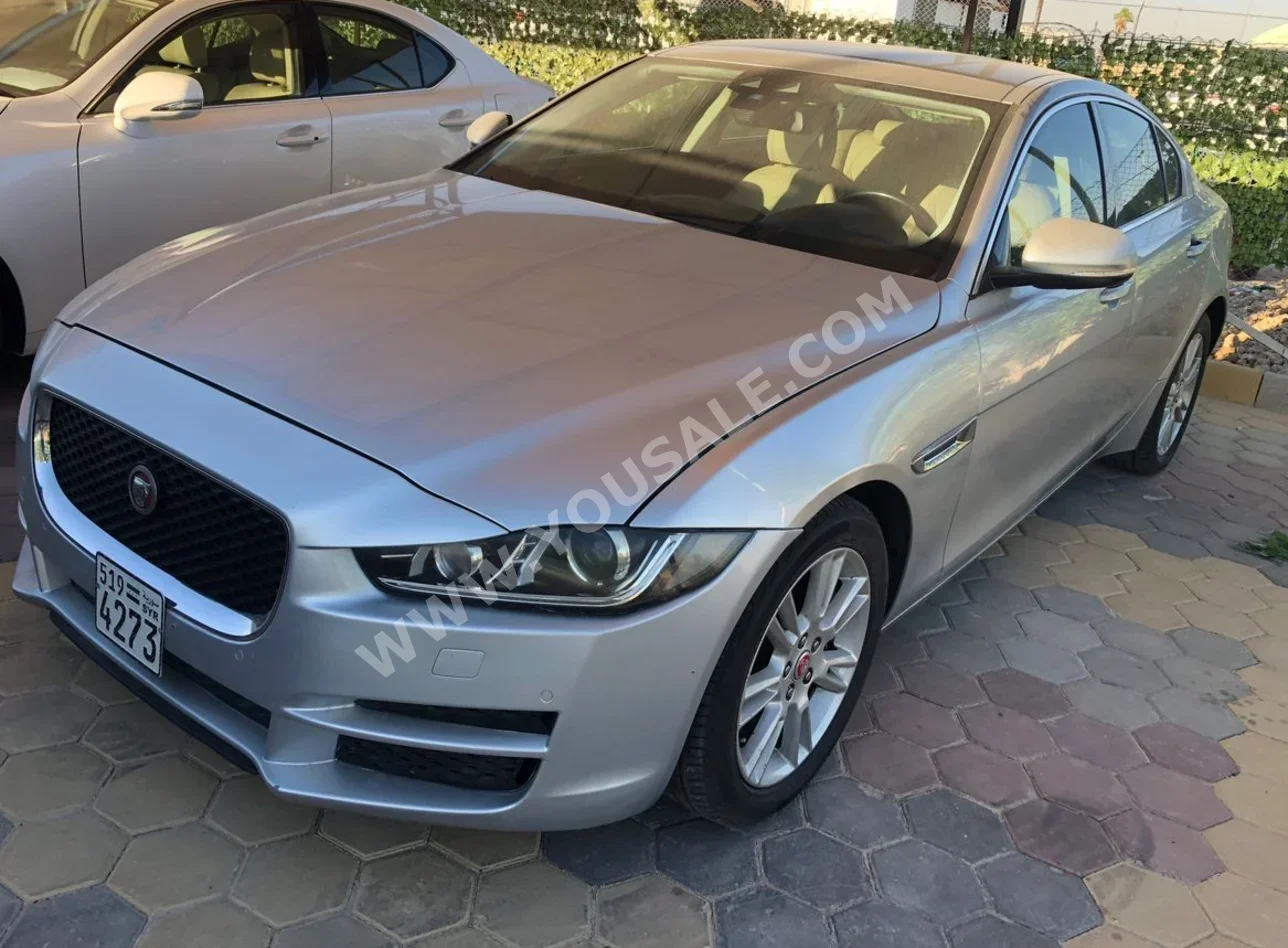 Jaguar  XE  2018  Automatic  100,000 km  4 Cylinder  RWD  Sedan  Silver  Gasoline