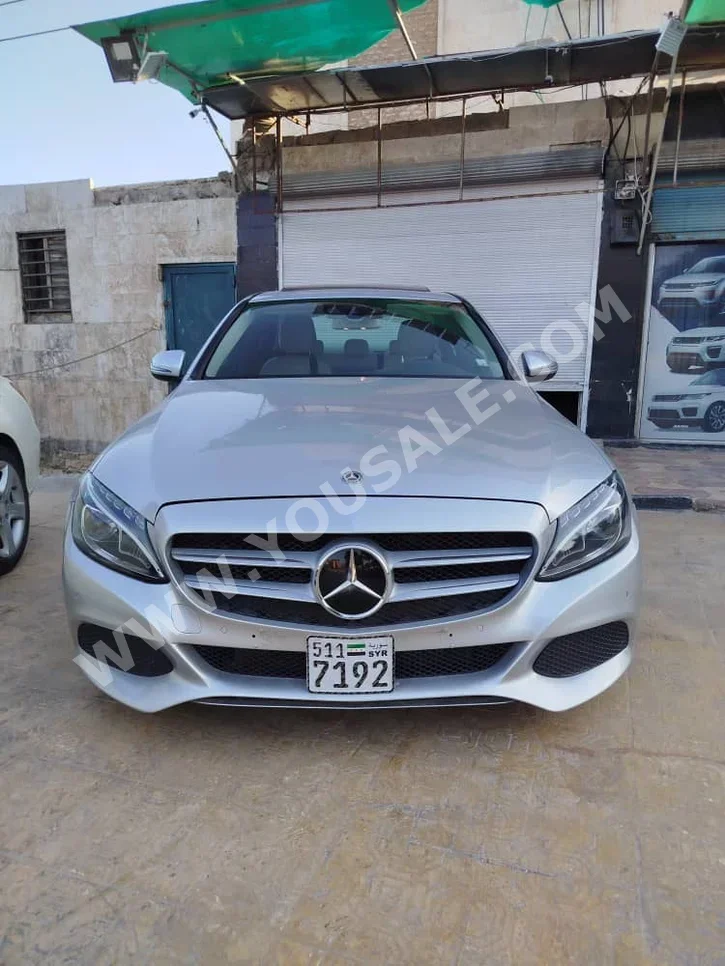 Mercedes-Benz  C-Class  350  2017  Automatic  70,000 km  4 Cylinder  RWD  Sedan  Silver  Hybrid