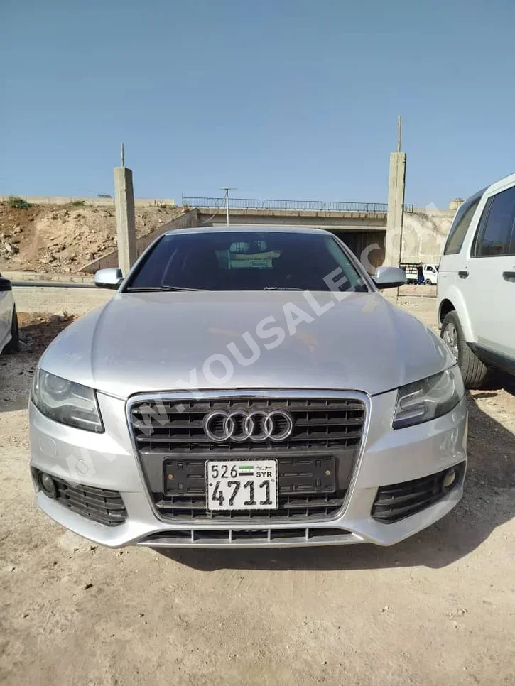 Audi  A4  2.0 T  2011  Automatic  230,000 km  4 Cylinder  4WD  Sedan  Silver  Gasoline