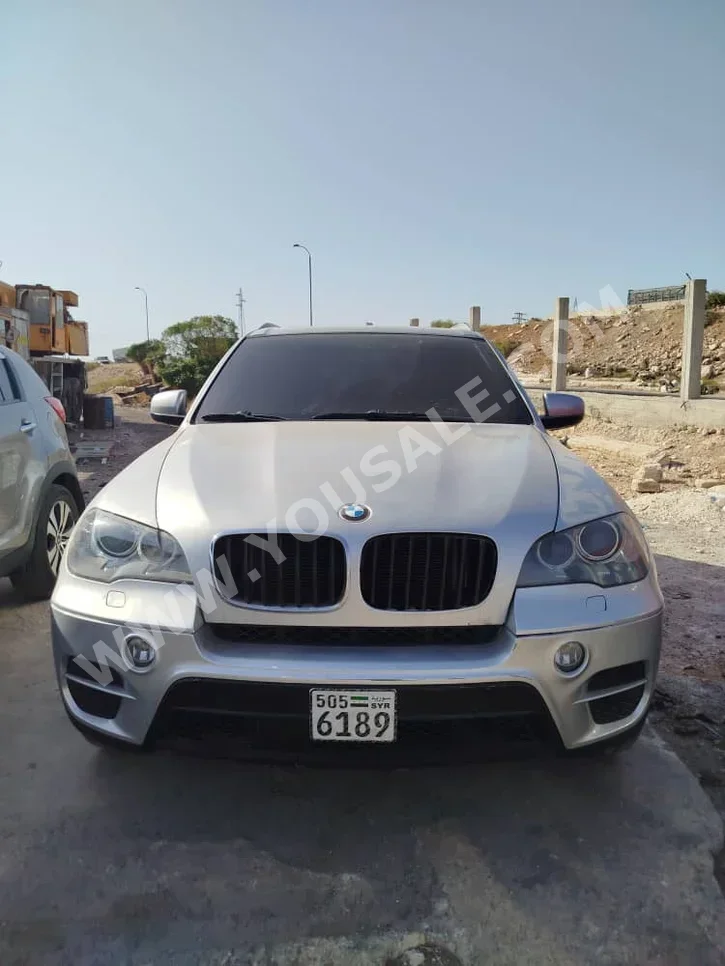 BMW  X-Series  5  2012  Automatic  220,000 km  6 Cylinder  4WD  SUV  Silver  Gasoline
