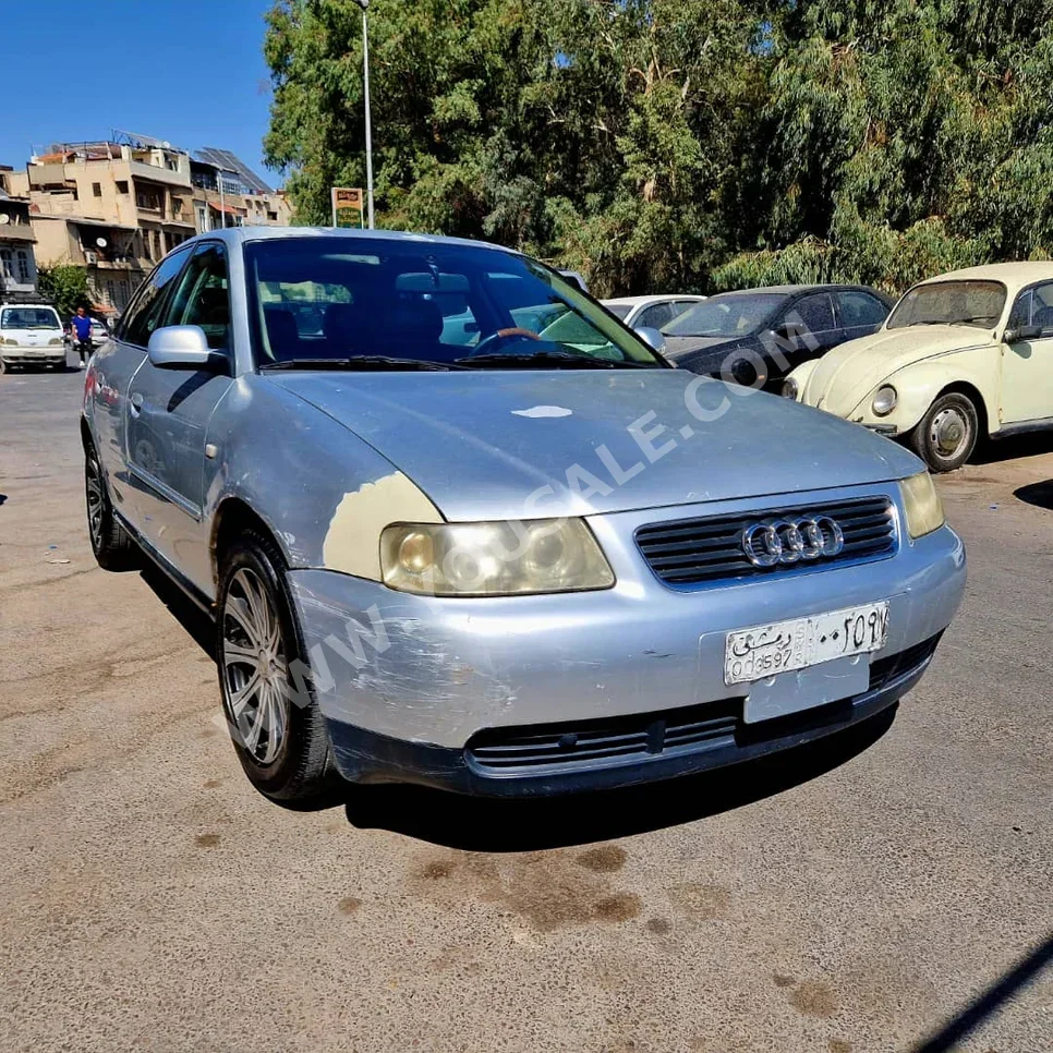 اودي أي 3 2001 اتوماتيك 220,000 كم 4 سلندر دفع خلفي سيدان فضي بنزين