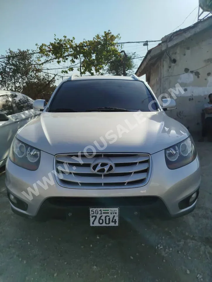 Hyundai  Santa Fe  2010  Automatic  200,000 km  4 Cylinder  FWD  SUV  Silver  Diesel