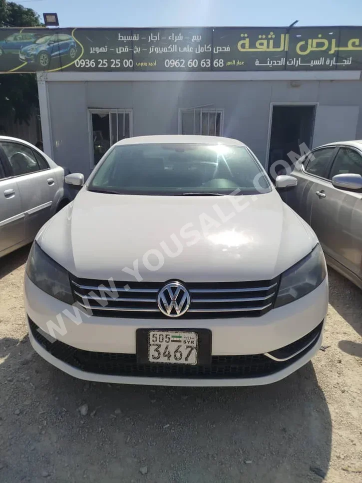 Volkswagen  Passat  2012  Automatic  150,000 km  4 Cylinder  FWD  Sedan  White  Diesel
