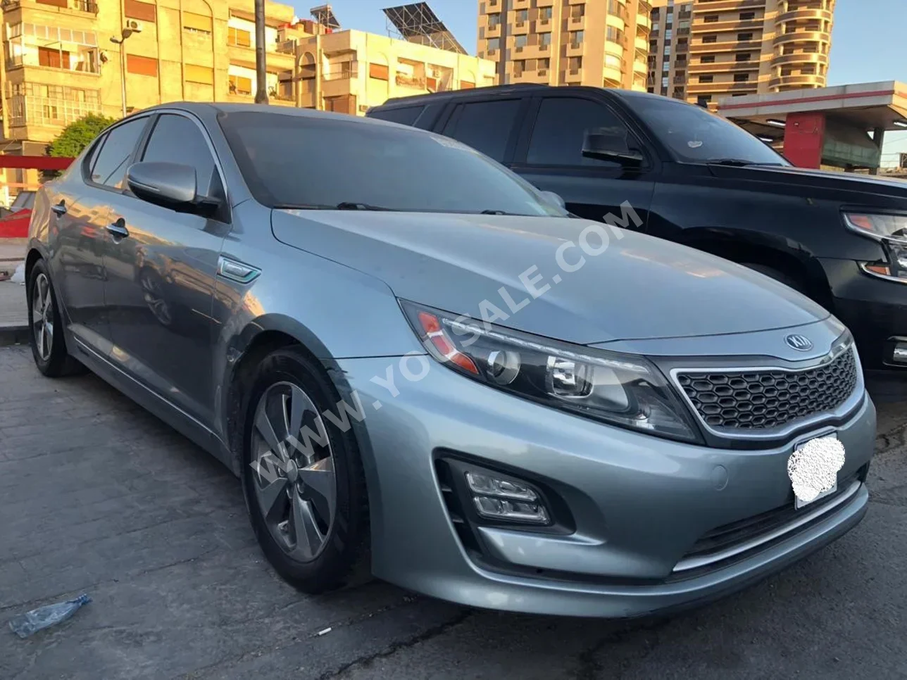 Kia  Optima  2015  Automatic  120,000 km  4 Cylinder  FWD  Sedan  Silver  Hybrid