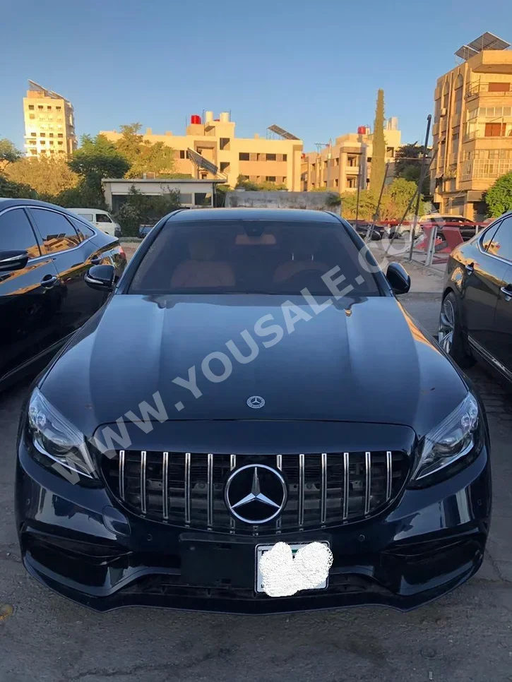 Mercedes-Benz  C-Class  200  2015  Automatic  125,000 km  4 Cylinder  RWD  Sedan  Dark Blue  Gasoline