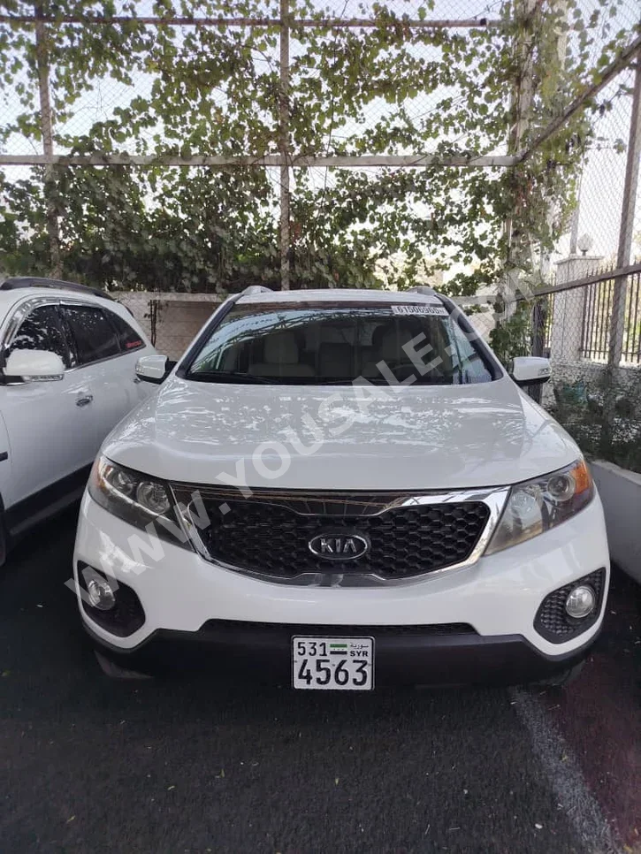Kia  Sorento  2011  Automatic  215,000 km  4 Cylinder  FWD  SUV  White  Gasoline