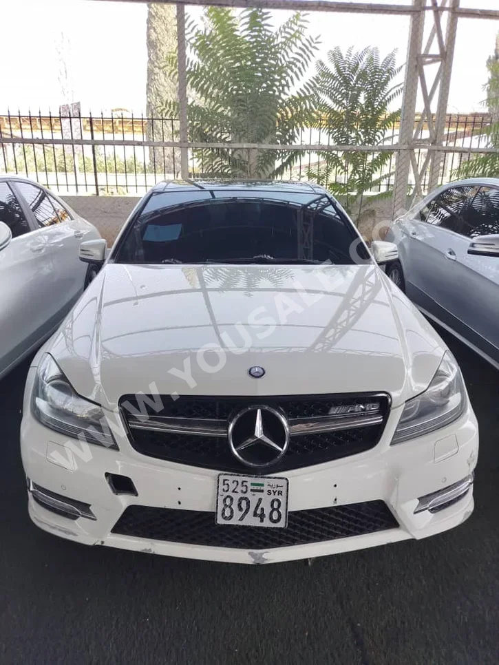 Mercedes-Benz  C-Class  220  2012  Automatic  207,240 km  4 Cylinder  RWD  Sedan  White  Diesel
