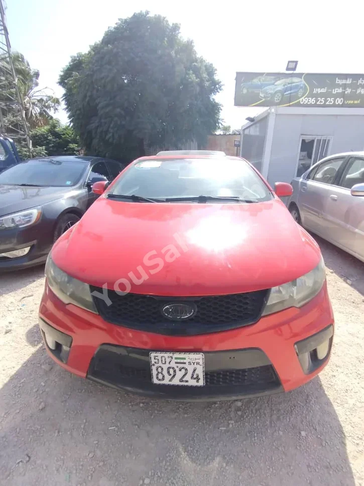 Kia Cerato Koup 2011 Automatic 120,000 km 4 Cylinder FWD Coupe / Sport Red Gasoline