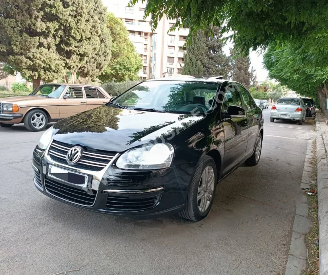Volkswagen  Jetta  2009  Automatic  160,000 km  4 Cylinder  FWD  Sedan  Black  Gasoline