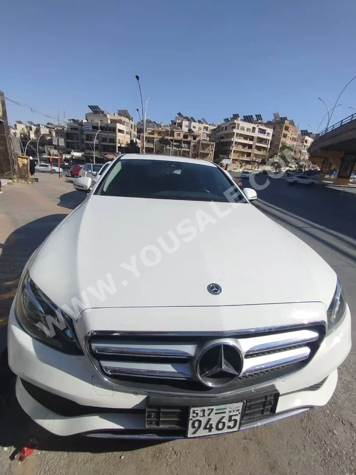 مرسيدس - بنز اي - كلاس 300 2018 اتوماتيك 107,000 كم 4 سلندر دفع خلفي سيدان أبيض بنزين