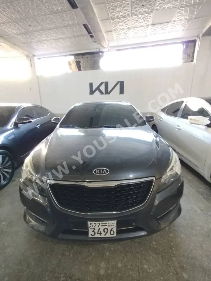 Kia  K7  2011  Automatic  200,000 km  4 Cylinder  FWD  Sedan  Dark Gray  Gasoline