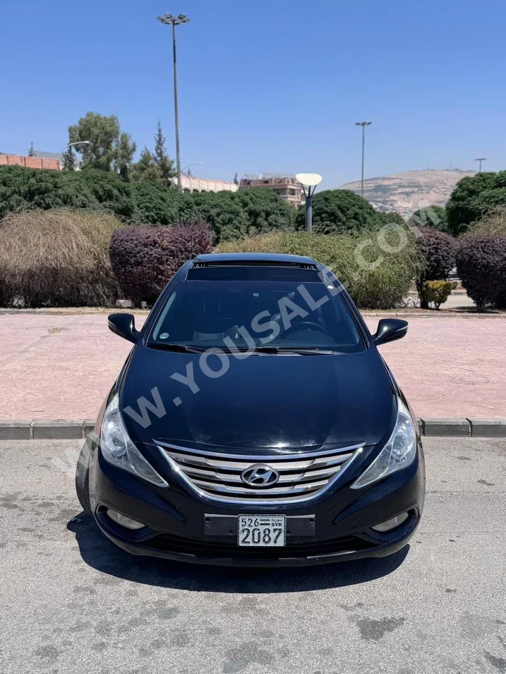 هيونداي سوناتا 2012 اتوماتيك 170,000 كم 4 سلندر دفع أمامي سيدان أسود بنزين
