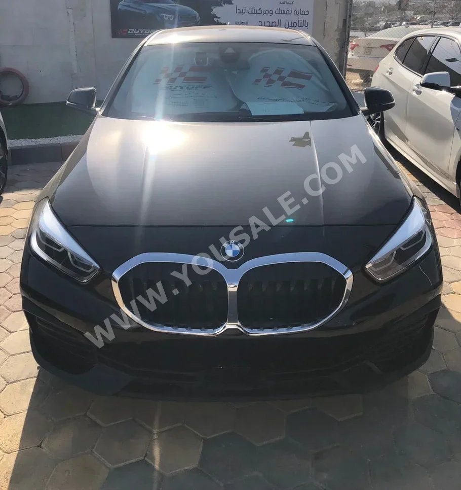 BMW  1-Series  120i  2022  Automatic  39,000 km  4 Cylinder  RWD  Hatchback  Black  Gasoline