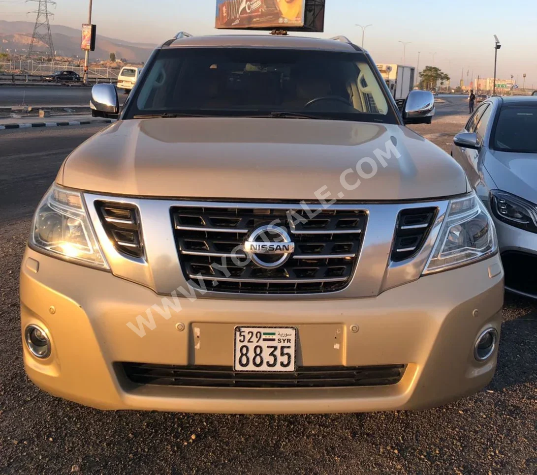 Nissan  Patrol  Platinum  2016  Automatic  140,000 km  8 Cylinder  4WD  SUV  Gold  Gasoline