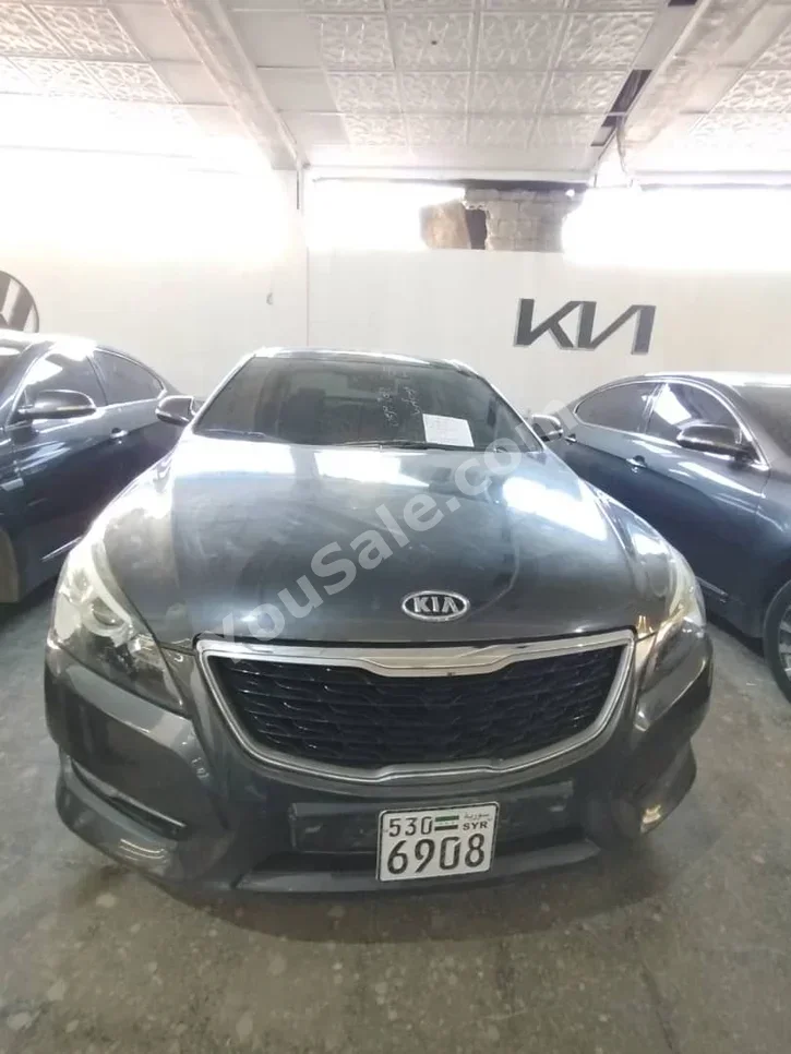 Kia  K7  2012  Automatic  142,000 km  4 Cylinder  FWD  Sedan  Dark Gray  Gasoline