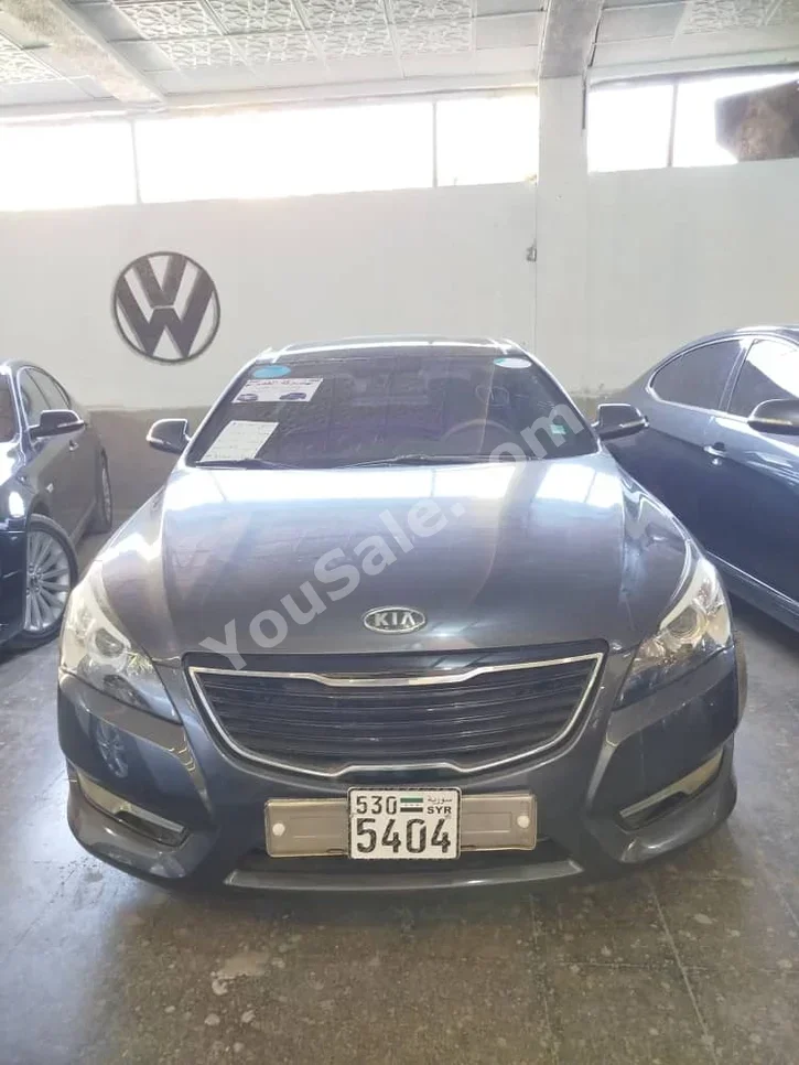 Kia  K7  2012  Automatic  192,000 km  4 Cylinder  FWD  Sedan  Dark Gray  Gasoline