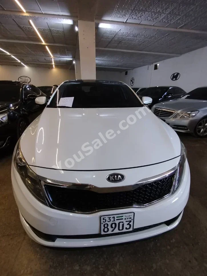 Kia  K5  2011  Automatic  67,000 km  4 Cylinder  FWD  Sedan  White  Gasoline