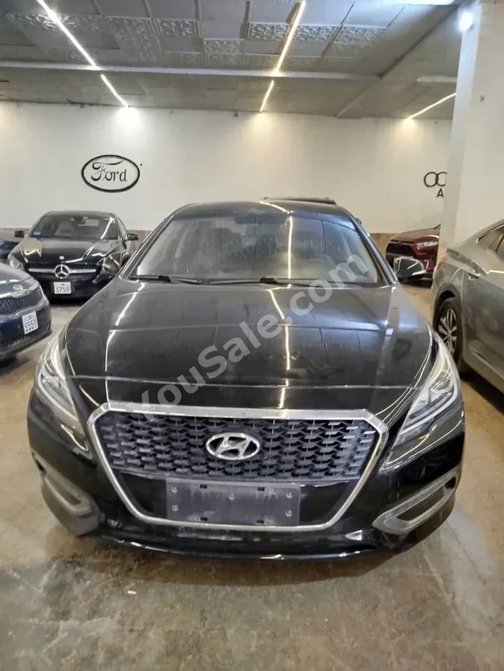 Hyundai  Sonata  2018  Automatic  150,000 km  4 Cylinder  FWD  Sedan  Black  Hybrid