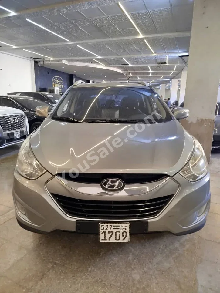 Hyundai Tucson 2011 Automatic 112,000 km 4 Cylinder FWD SUV Silver Diesel