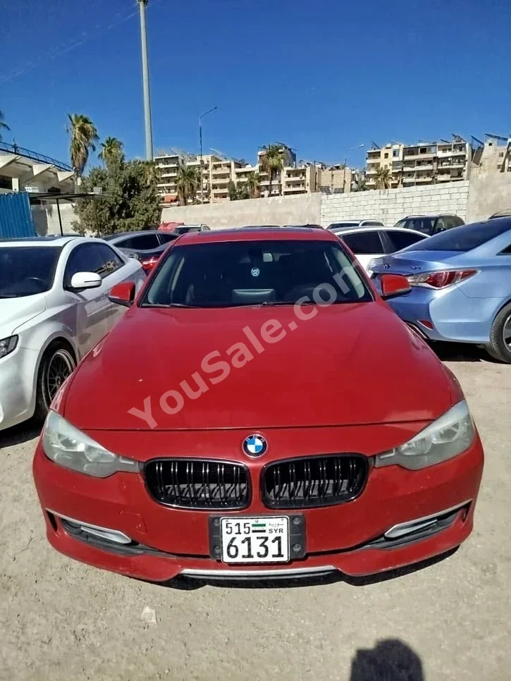 BMW  3-Series  320  2015  Automatic  160,000 km  4 Cylinder  4WD  Sedan  Red  Diesel