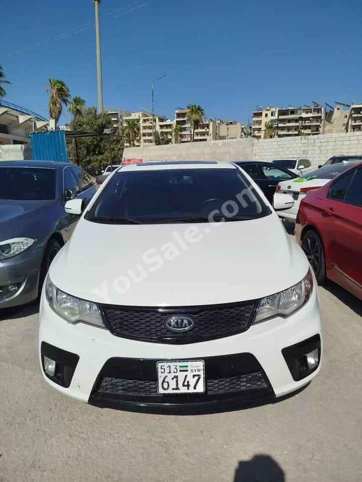 Kia Forte 2013 Automatic 220,000 km 4 Cylinder FWD Coupe / Sport White Gasoline