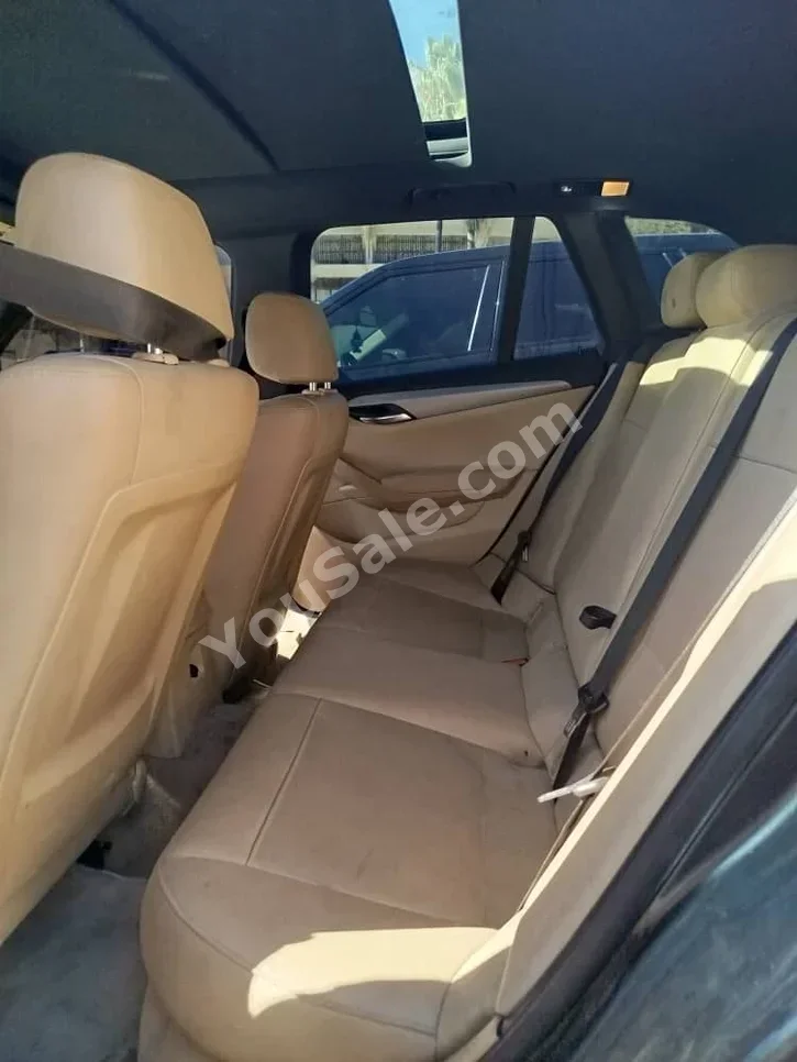 BMW  X-Series  1  2013  Automatic  156,000 km  4 Cylinder  FWD  Hatchback  Dark Gray  Gasoline