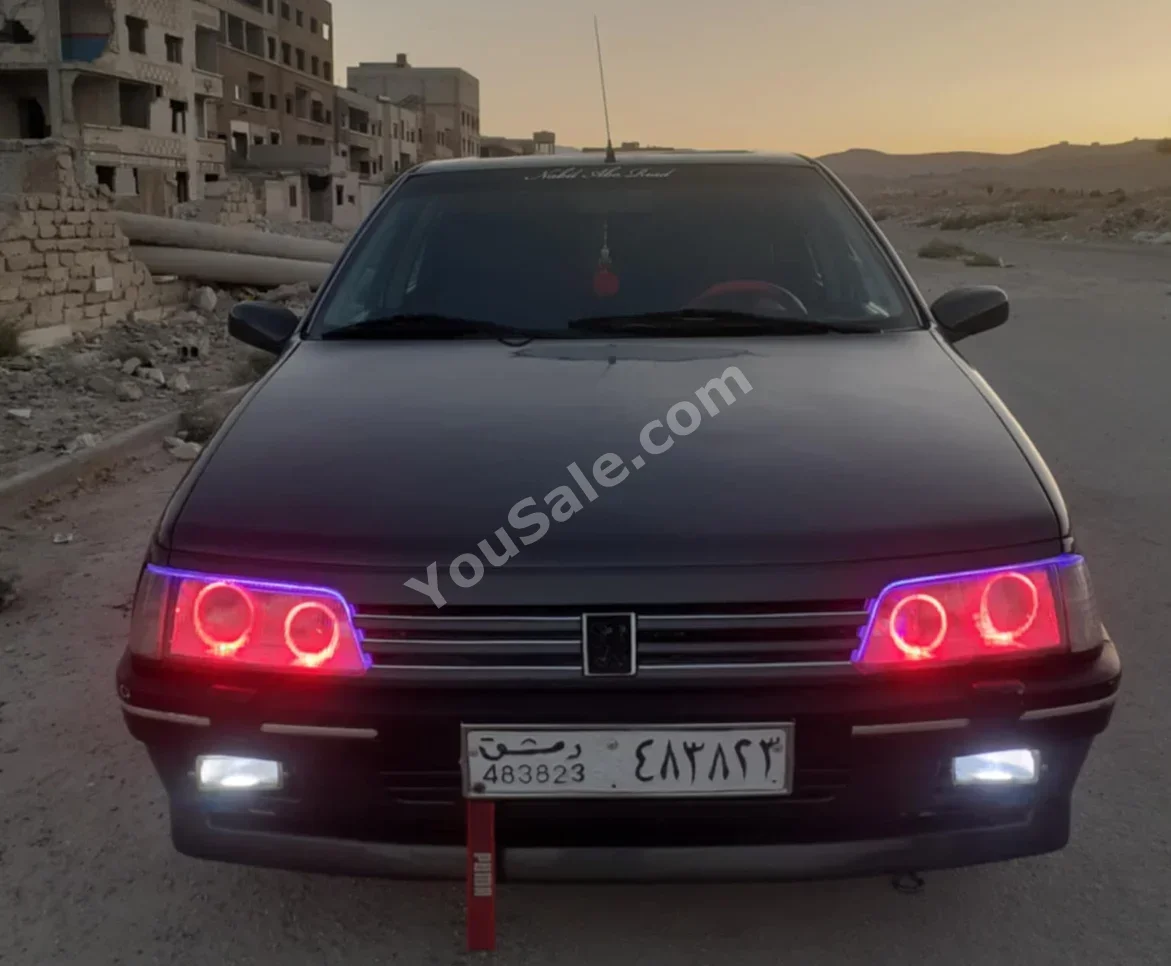 بيجو 405 2005 اتوماتيك 190,000 كم 4 سلندر دفع أمامي سيدان أسود بنزين