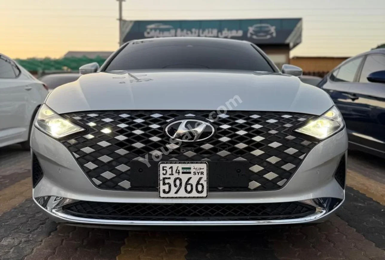Hyundai  Grandeur  2021  Automatic  45,000 km  4 Cylinder  FWD  Sedan  Silver  Gasoline