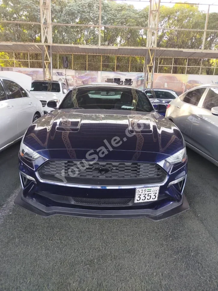 فورد موستانغ جي تي 2019 عادي 40,594 كم 4 سلندر دفع خلفي كوبيه \ سبورت ازرق بنزين