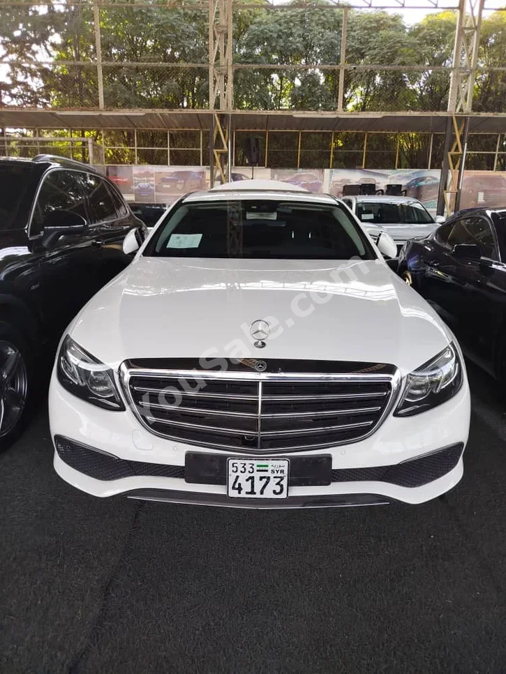 Mercedes-Benz  E-Class  220  2020  Automatic  87,956 km  4 Cylinder  RWD  Sedan  White  Diesel