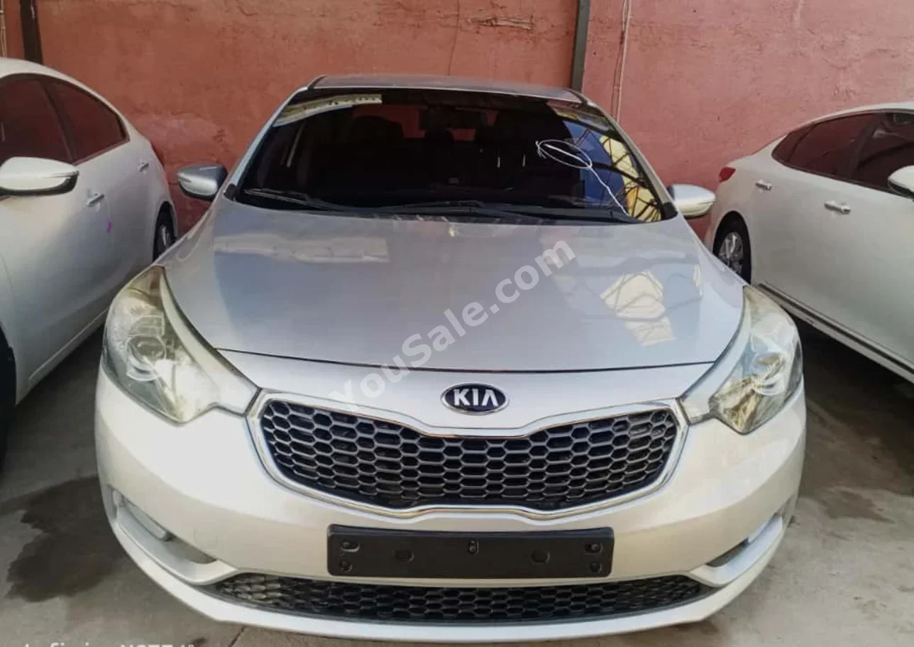 Kia  K3  2015  Automatic  120,000 km  4 Cylinder  FWD  Sedan  Gray  Gasoline