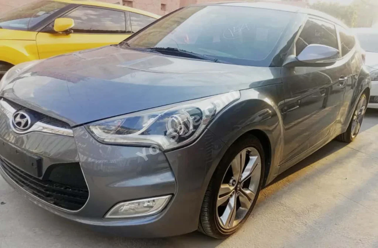 Hyundai  Veloster  2012  Automatic  180,000 km  4 Cylinder  FWD  Hatchback  Dark Gray  Gasoline