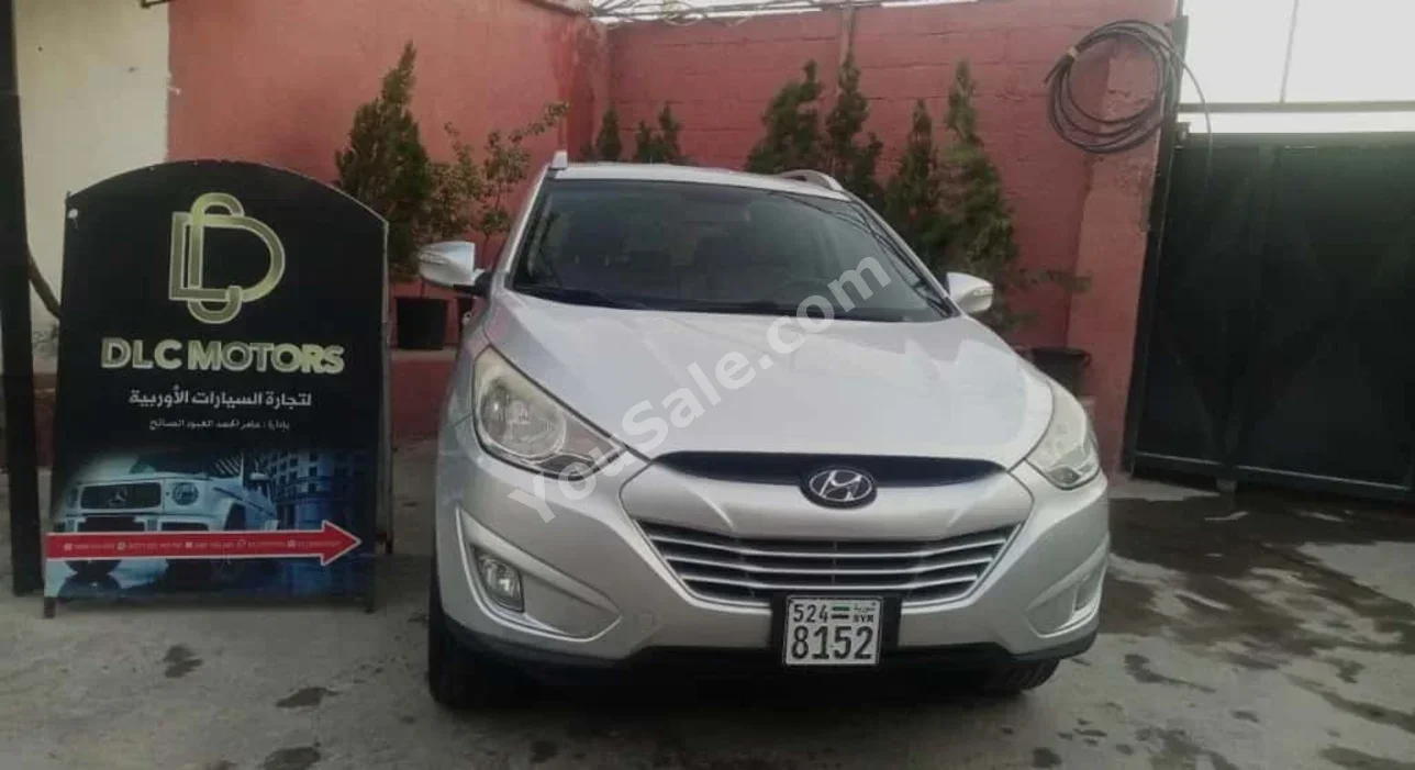 Hyundai  Tucson  2011  Automatic  150,000 km  6 Cylinder  FWD  SUV  Silver  Gasoline
